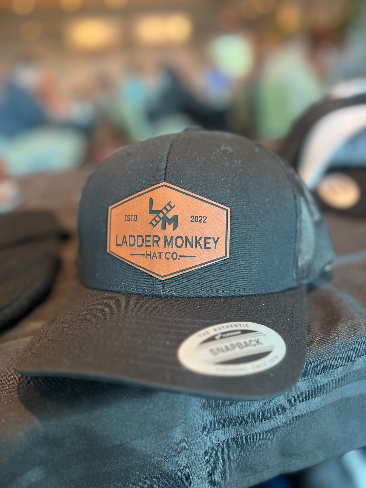 LM branded patch Cap